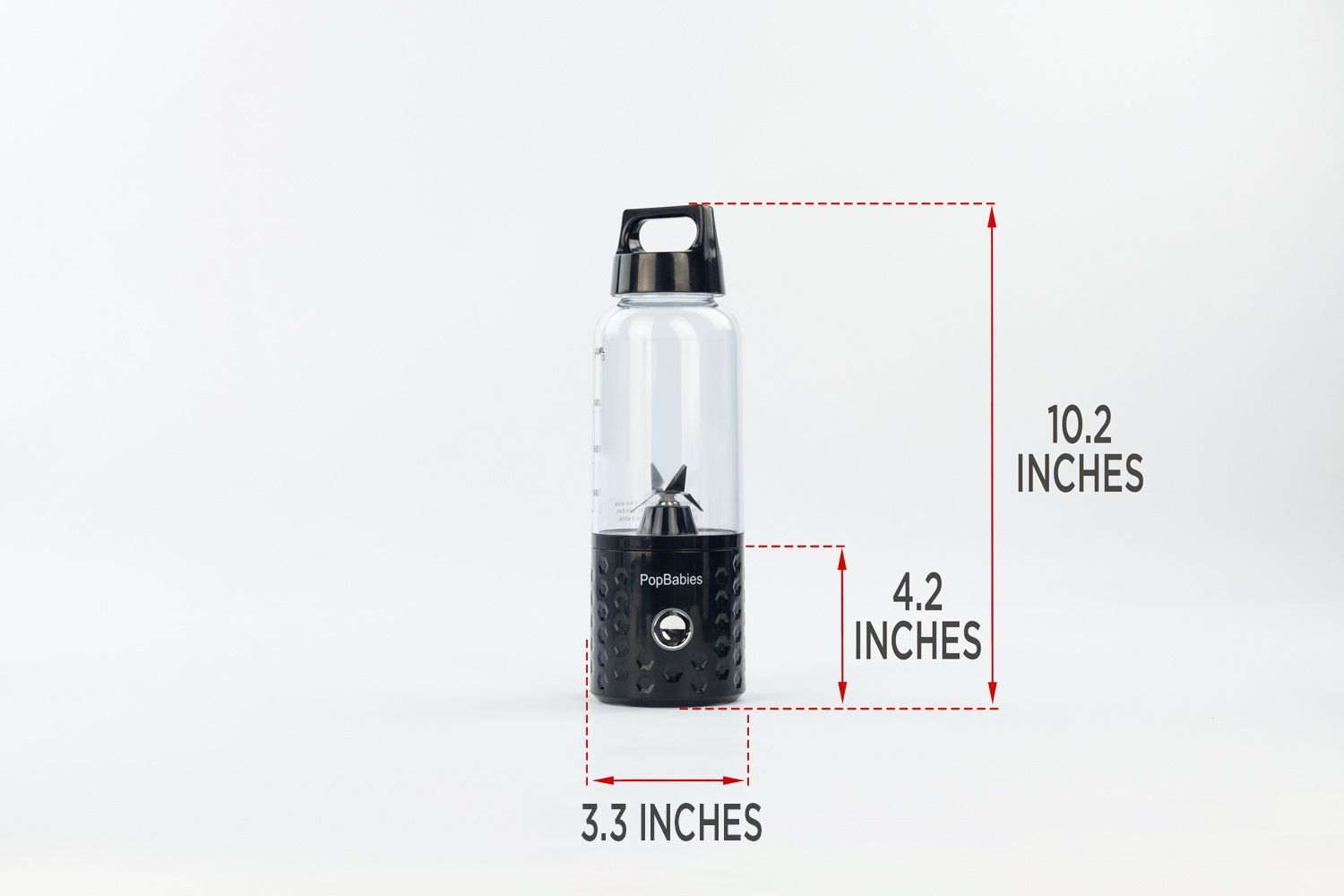 The PopBabies portable blender standing on a table, with the length of its motor base being noted to the side as 4.2 inches, and the total length and width of the unit as 10.2 inches and 3.3 inches, respectively. 