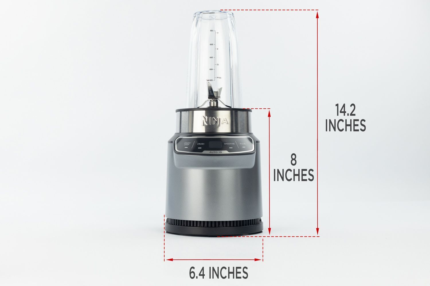 The Ninja BN401 Nutri Pro personal blender standing on a gray table, with the length of its motor base being noted to the side as 8 inches, and the total length and width of the unit as 14.2 inches and 6.4 inches, respectively.