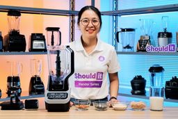 For her protein shake test, Tina adds almonds, dried blueberries, oats, milk, and protein powder to the blender, then starts blending while timing the process on her phone. As the mixture smooths out, she stops the blender and strains the shake through a fine-mesh strainer, which is used to catch any lingering bits or sediment, so she can better evaluate the final texture.