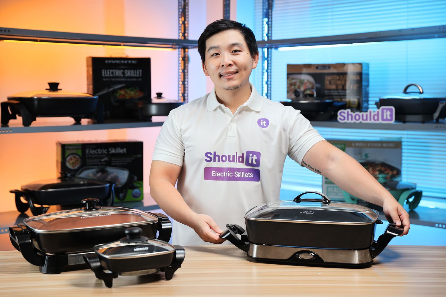 Alan Nguyen in the ShouldIt's Lab testing the electric skillets