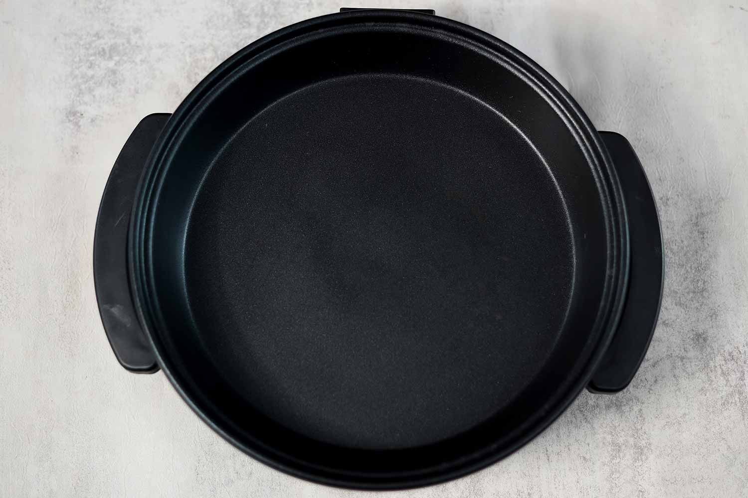 The pan of the Ovente Non-Stick Electric Skillet SK11112B is 10.24 inches in diameter and 1.38 inches in depth.