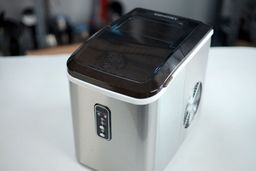 Top down view of the EUhomy countertop ice maker showing condensation on the lid.