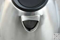 The mesh filter attached to the plastic black V-shaped spout of the Elite Gourmet Electric Glass Kettle (EKT-602)