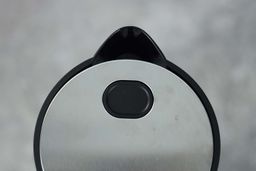 The black plastic V-shaped spout of the Peach Street Electric Kettle PE-1300.