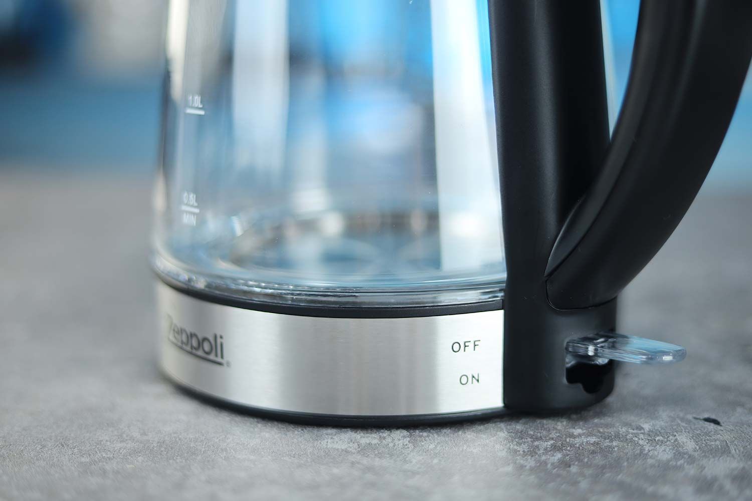 The clear plastic power switch of the Zeppoli Electric Kettle ZPL-KETTLE.