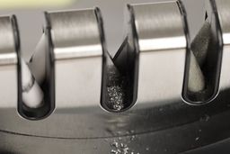 Metal residue on an abrasive slot on the Amesser handheld knife sharpener