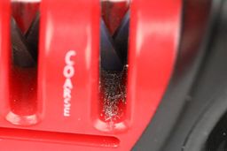 Medal dust on an abrasive slot on the Zwilling knife sharpener