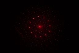 The Mecurate IRT600A laser dot pattern in a dark room.