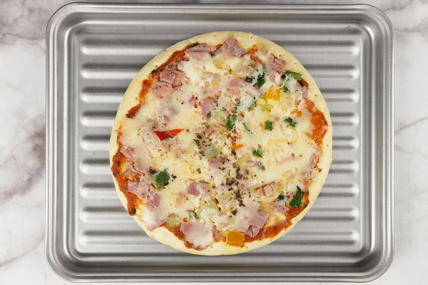 How We Test Baking Pizza with our Toaster Ovens