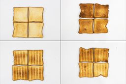 On the left are the top and bottom of four pieces of toast from the first batch, and on the right are from the second batch.