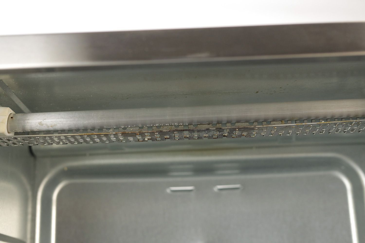 Black and Decker 4 Slice Toaster Oven CleanabilityThe cleaned upper heating element guard of the Black+Decker TO1760SS Natural Convection Toaster Oven with some discoloration.