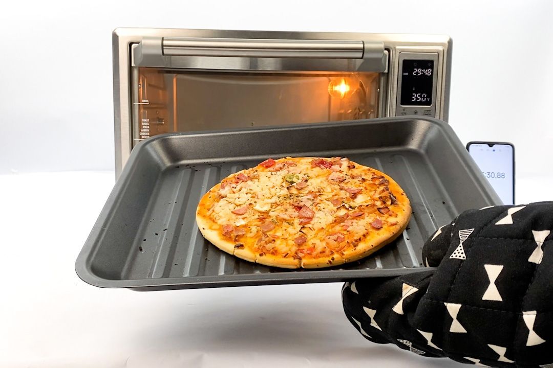 Frozen pizza large in air fryer toaster oven