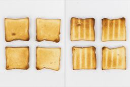 The best four pieces of toast from the Oster TSSTTVFDDG XL Digital French Door Convection Toaster Oven. On the left are the top sides, and on the right are the bottom sides of the toast.