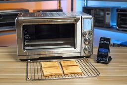 A rack of 4 slices of golden brown toast using the toast level five the Breville BOV900BSS Smart Oven Air Fryer Pro which takes 6 min 22 sec.