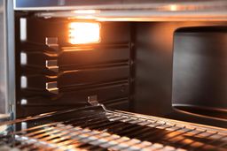 The light and 4 guide rails of the Breville BOV900BSS Smart Oven Air Fryer