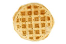 The pale gold bottom crust of a waffle baked for 8 minutes using a batter made from the Birch Benders mix