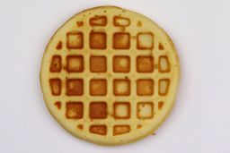 The light brown bottom crust of a waffle baked for 6 minutes using our self-mixed recipe.