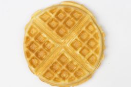 The golden brown top side of the waffle made by the Cuisinart WAF-F20P1 Double flip waffle maker in 5 minutes.