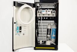 Inside the cabinet of the Avalon A5 water cooler dispenser.