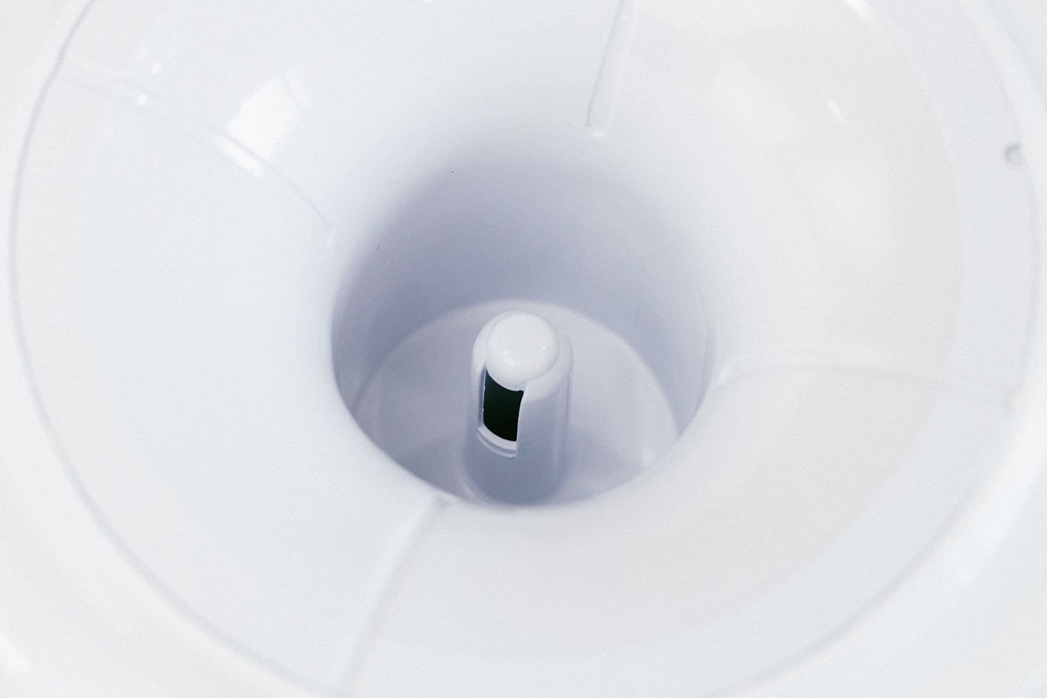 Close up of a water needle of a top-loading water cooler dispenser.