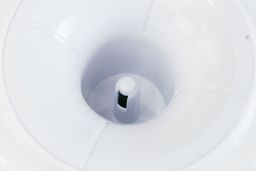 Close up of a water needle of a top-loading water cooler dispenser.