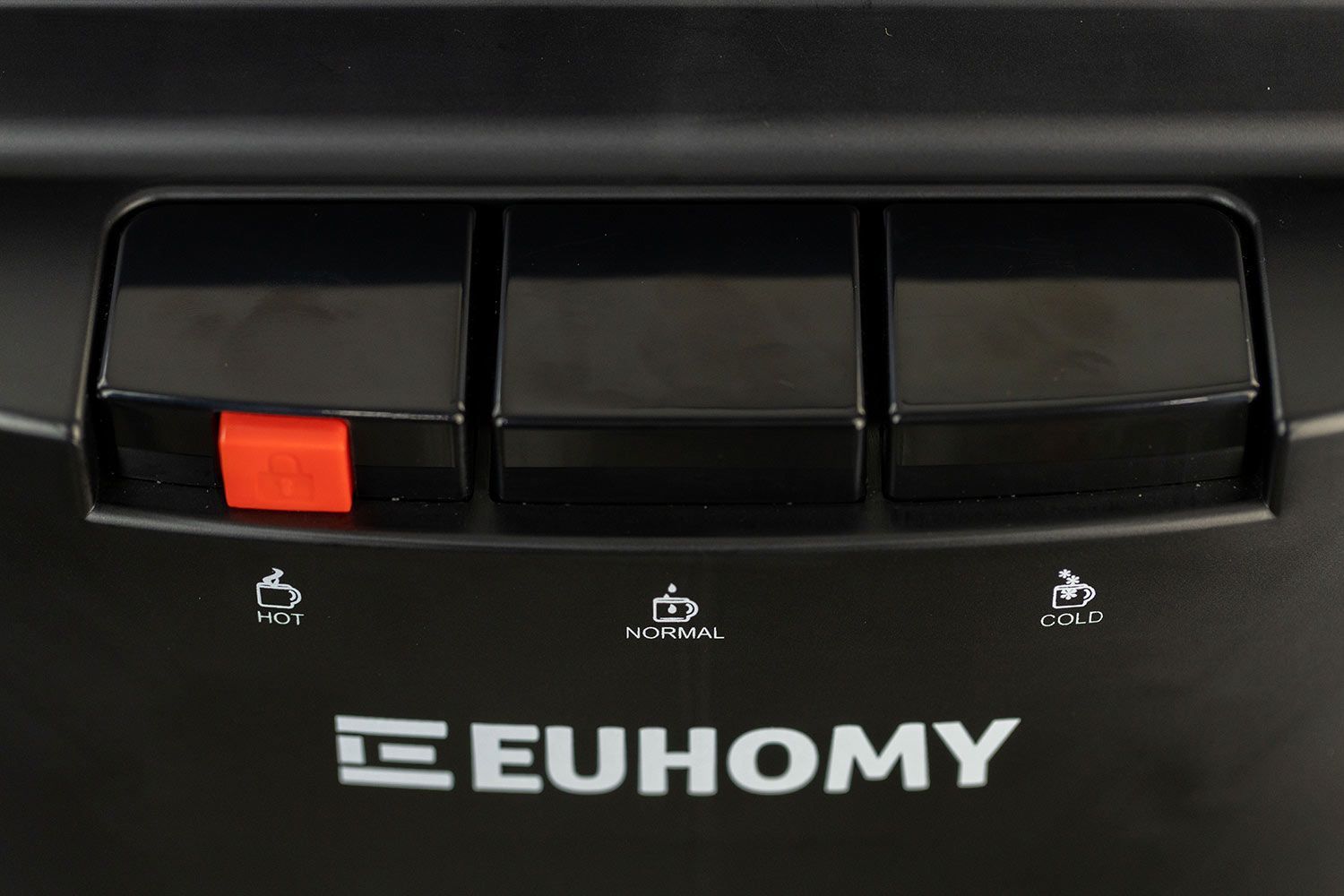 Three press buttons for dispensing water found on a water cooler dispenser.