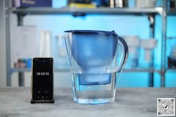 Brita Marella water filter pitcher next to smartphone timer